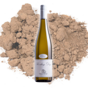 Villa Wolf Riesling Dry bottle overlays sandy loam soil